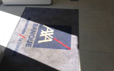 Tapis personnalisé pour l’agence AXA Caron (France)