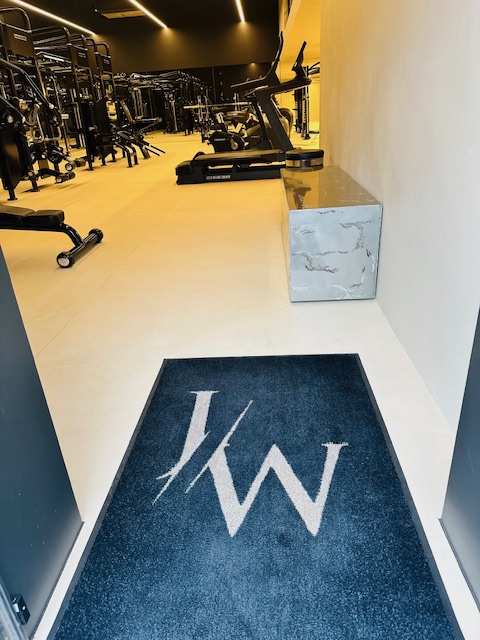 tapis logo salle de fitness Just Work Out